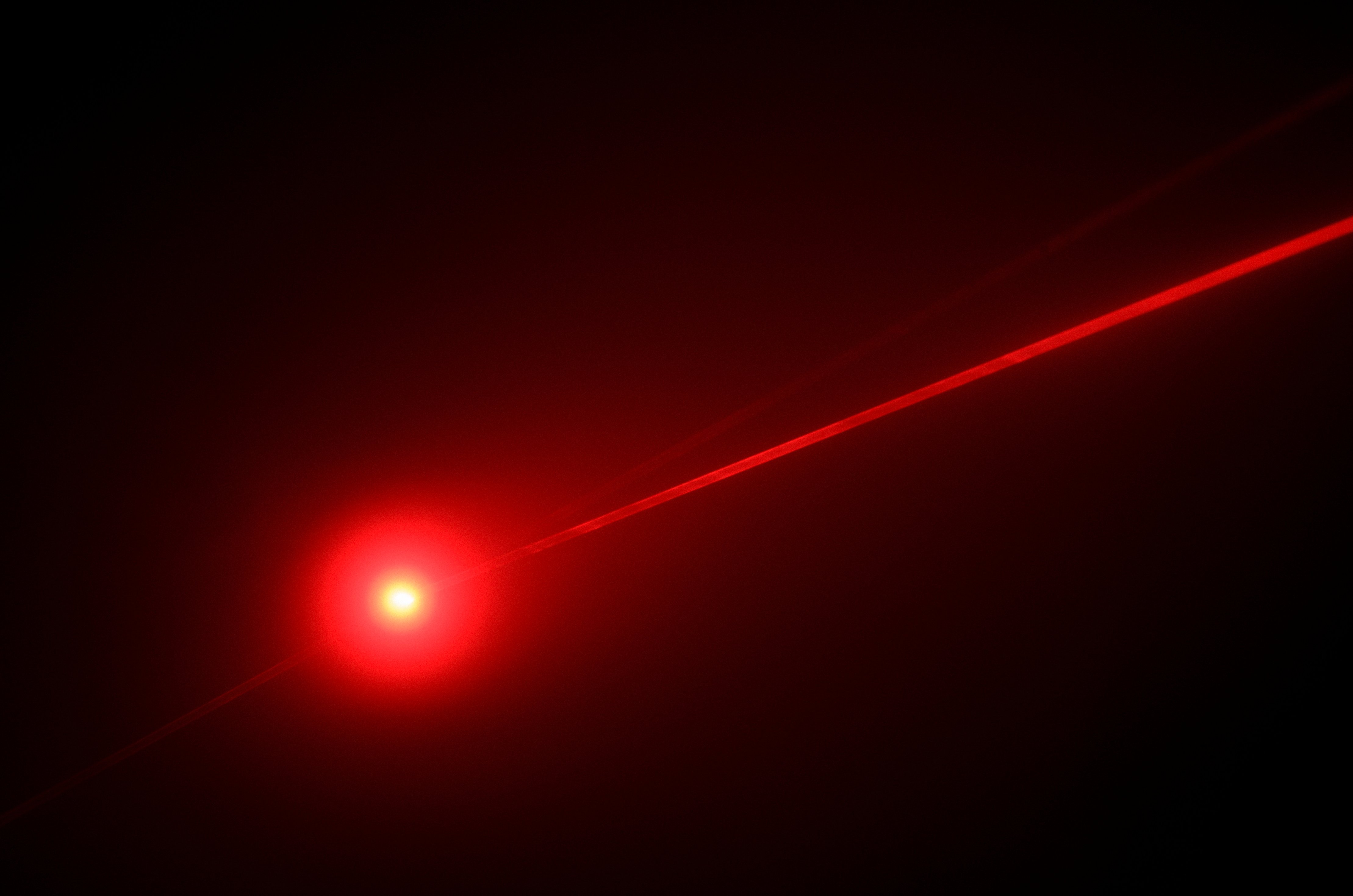 Red Laser Beam and Reflections